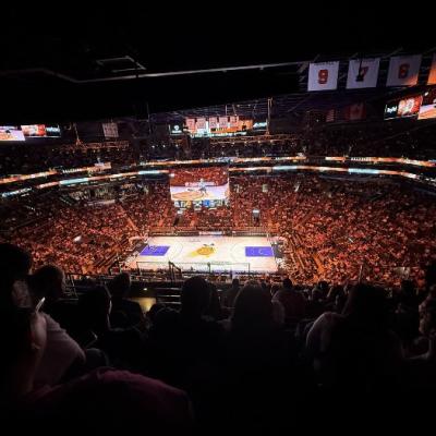 SDMM team attending an NBA game in Phoenix during professional development travel, highlighting company culture and mentorship